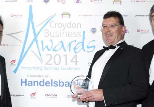 Paul Bates receiving Best Medium Sized Business award