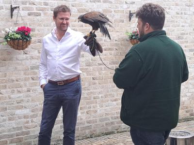 Ben Randall introduces the birds to CLS staff member
